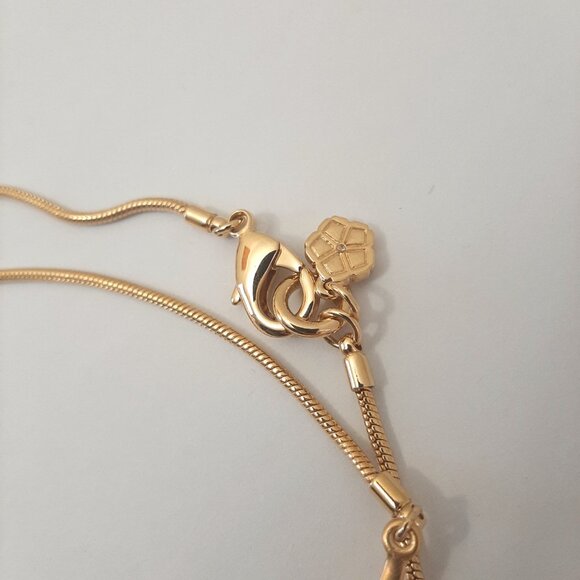 Trina Turk Glossy Gold Wavy Long Necklace - Picture 4 of 5